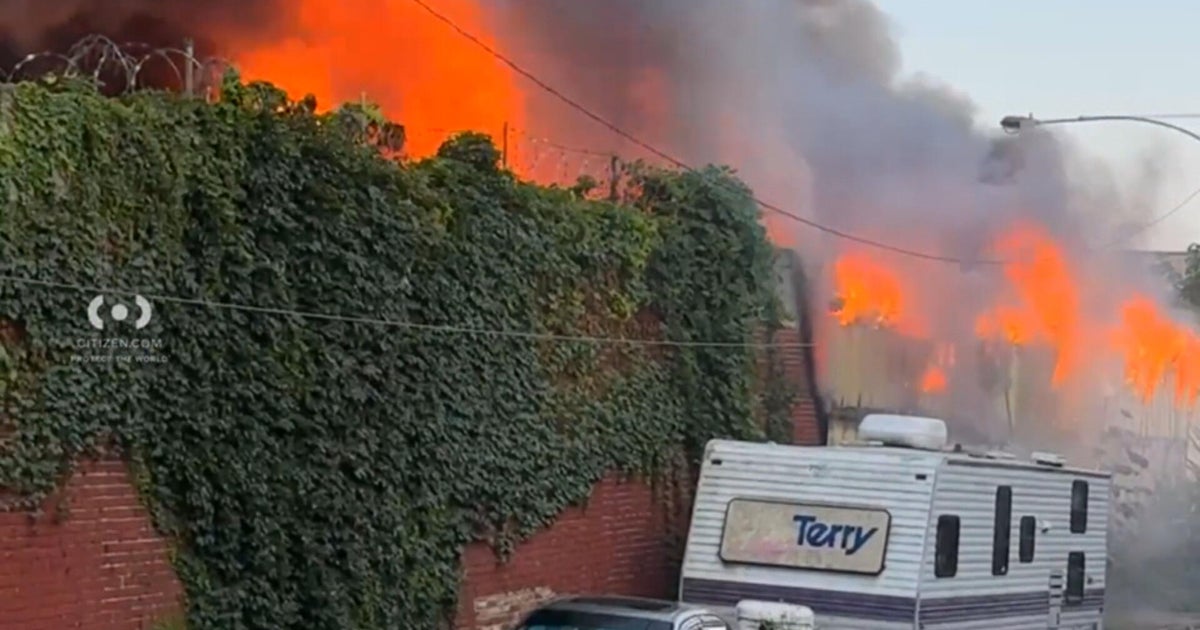 Large fire burning at scrap metal yard in North Philadelphia