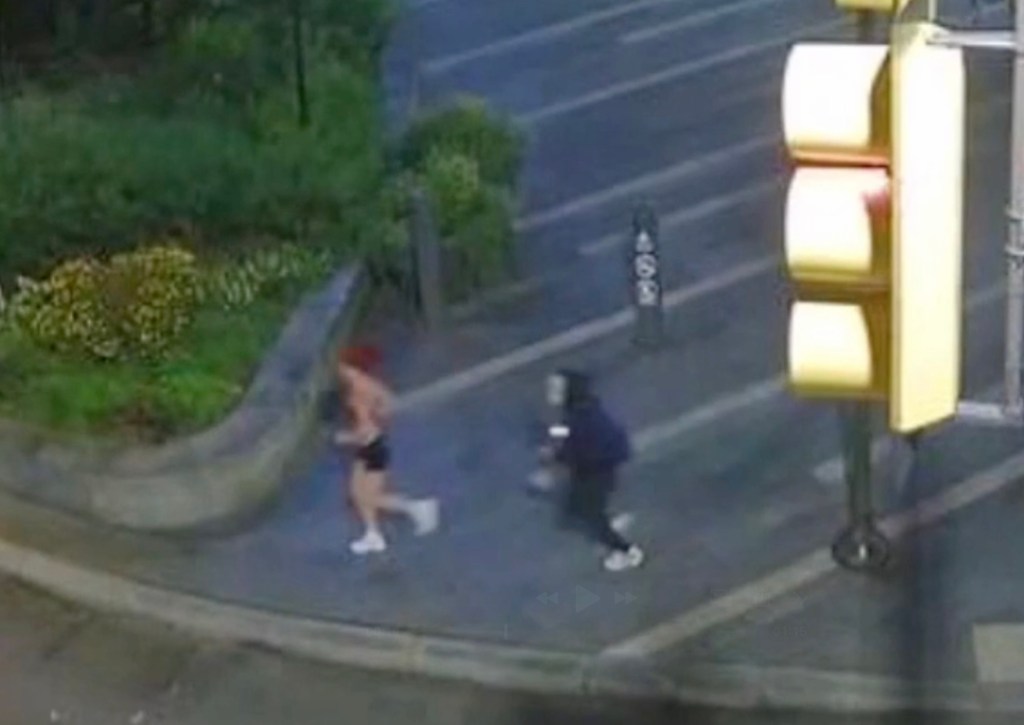 Security camera footage shows a jogger being followed by a person in a mask.