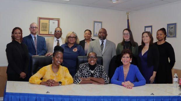 Collingdale officials after the first reorganizational borough council meeting in January 2026, standing from left, Deanna Williams, solicitor; Joe Papaleo, borough manager; David Lee Robinson, councilman; Sheena Butler, secretary/Right to Know officer; Keisha Williams, councilwoman; Dwight Green, councilman; Rebecca Perry, tax collector; Shannon Murphy, councilwoman; and Tiffany Allan, labor council. Seated are, from left, Fareeda Mabry, councilwoman; Felecia Coffee, council president; and Mayor Donna Matteo-Spadea. Coffee was ousted and Mabry was named president. (COURTESY OF JOY WINNER)