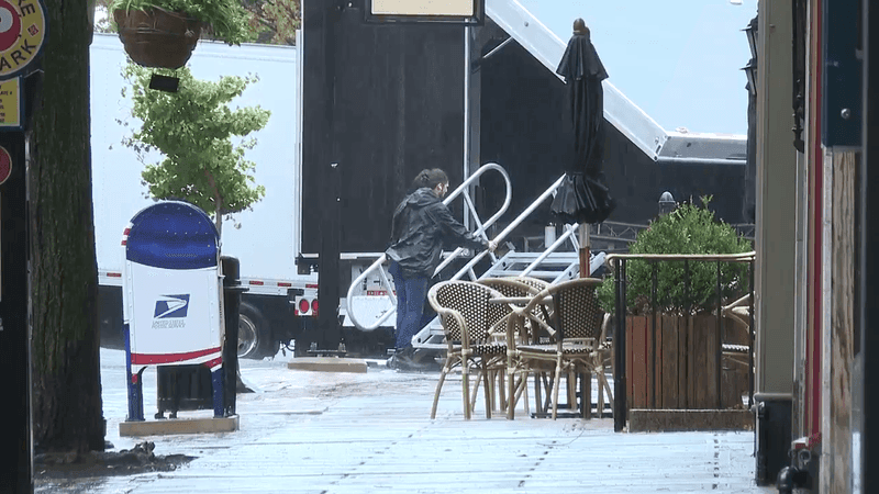 Crews clean up after the Lancaster Capital Day celebration was cut short due to rain in the area. (WHP)
