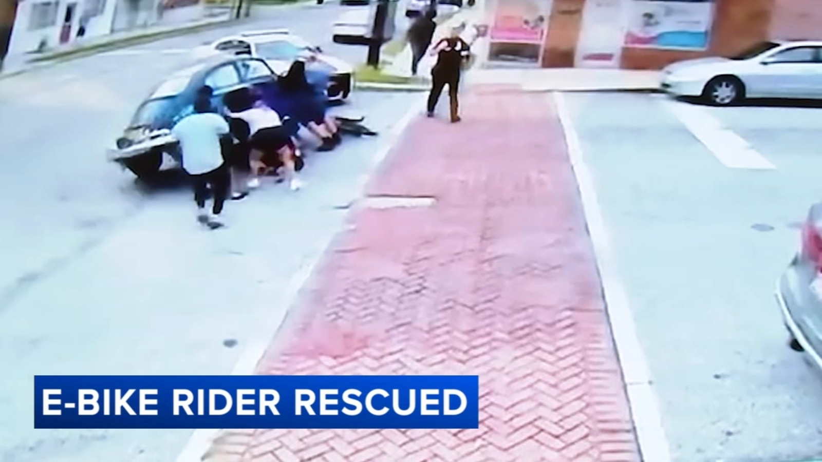 Good Samaritans helped lift a car to free a woman trapped underneath after a horrific e-bike crash in Prospect Park, Pennsylvania