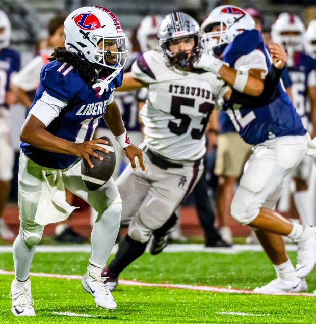 Liberty's quarterback Alsaiah Gross scrambles to pass Thursday, Sept. 10, 2026, against Stroudsburg during a football game at BASD Stadium in Bethlehem.(April Gamiz/The Morning Call)