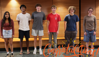 six students pose for photo
