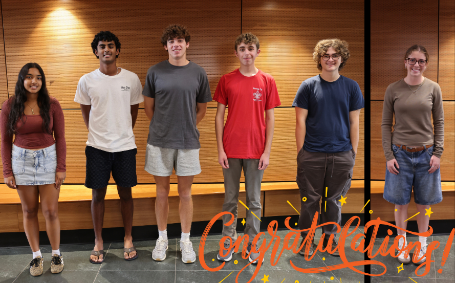 six students pose for photo