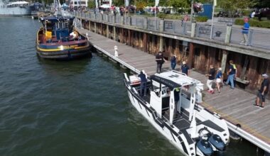 An electric workboat powered by Photon Marine outboards docked on the Erie Canal. [Photo: Photon Marine]