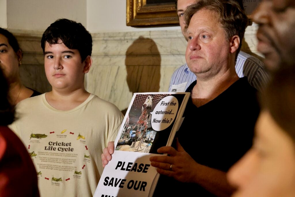 Protesters, including 12-year-old Jack Erfer (left)