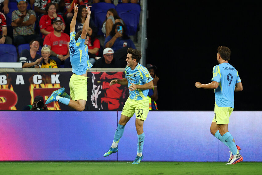 Philadelphia Union midfielder Indiana Vassilev (19) celebrates a goal by forward Milan Iloski (10) against the New York Red Bulls during the first half at Sports Illustrated Stadium.