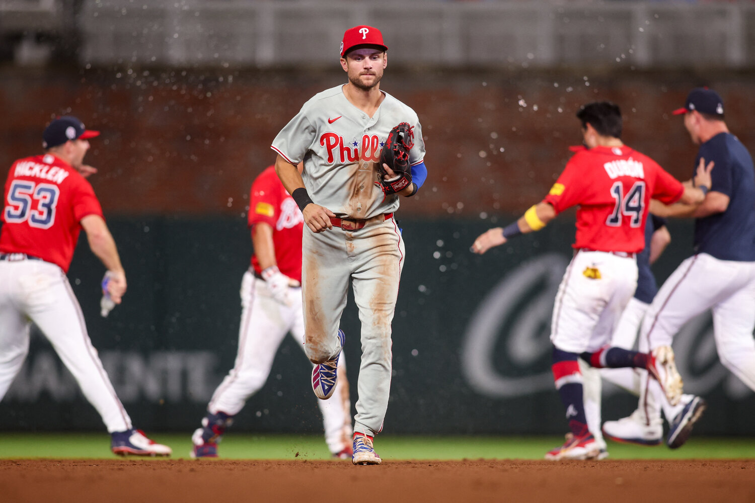 Philadelphia Phillies shortstop Trea Turner (7) runs off the field after a walk-off double by Atlanta Braves designated hitter Drake Baldwin (30) in the eleventh inning at Truist Park.