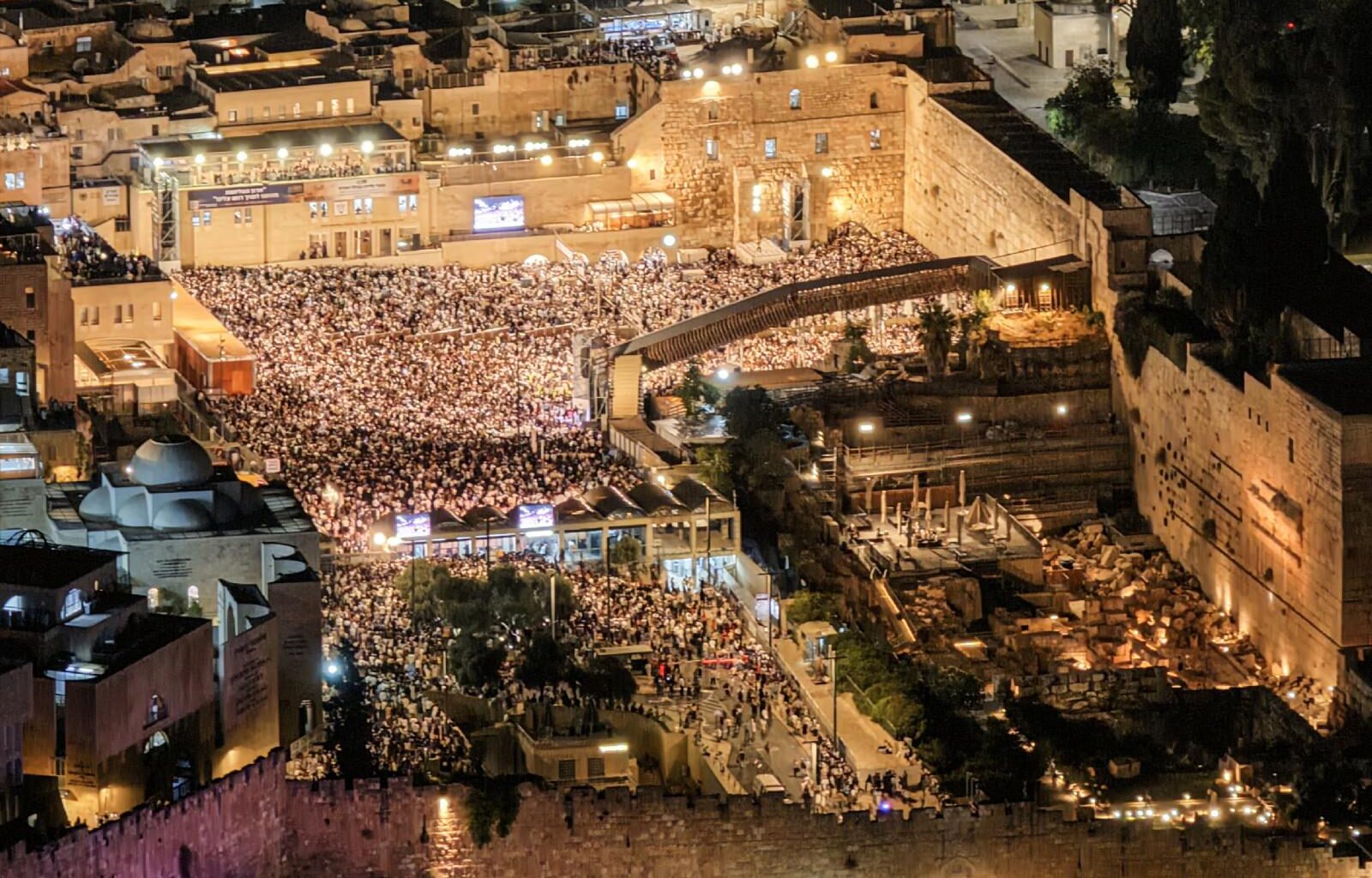 A drone view of Jewish worshippers taking part in Slichot, a prayer in which Jews offer repentance and ask God to forgive their sins at the Western Wall in Jerusalem