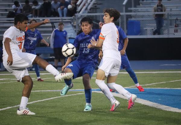Albany High soccer players in action against Bethlehem