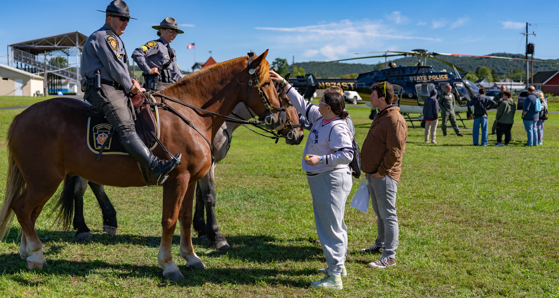 Sunny Day warmth: Annual Pennsylvania State troopers camp brings together special needs community and law enforcement agencies -