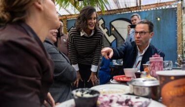 Gov. Josh Shapiro talks to patrons alongside Michigan Gov. Gretchen Whitmer out in the back patio of Sam’s Morning Glory Diner in South Philadelphia on Friday, Sept. 25, 2026. Shapiro is canvassing to get Pennsylvania Democrats elected up and down the ballot as the midterms are upcoming in November.
