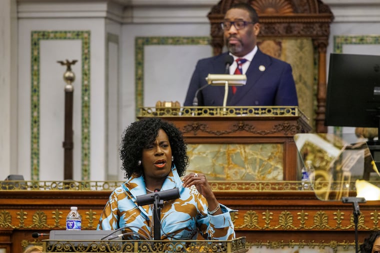 Philadelphia Mayor Cherelle L. Parker gave her budget presentation to City Council in Council Chambers on March 12. In the background is Council President Kenyatta Johnson.