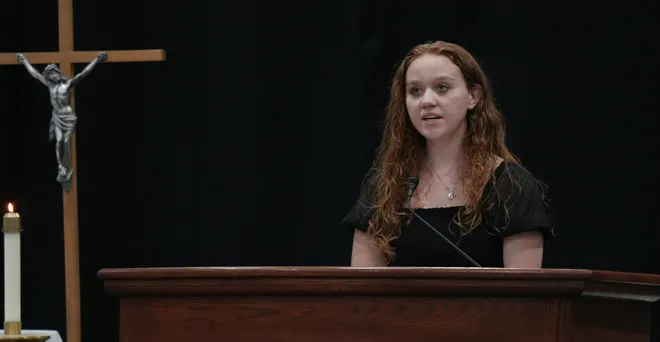 Amelia Fontaine leads a responsorial psalm during the Mercyhurst University Centennial Mass inside the Mercyhurst Athletic Center in Erie, Pa., on Sept. 24, 2026. Mercyhurst College was founded by Mother Borgia Egan and the Sisters of Mercy in Erie, who trace their heritage to Dublin, Ireland. Mercyhurst opened to women in September of 1926.