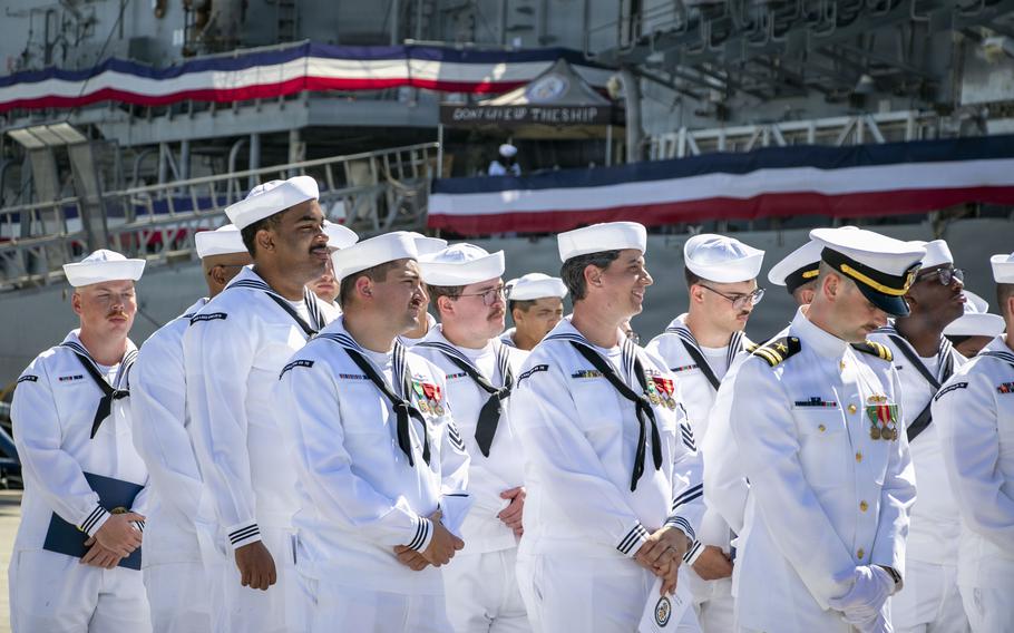 Sailors walk together.