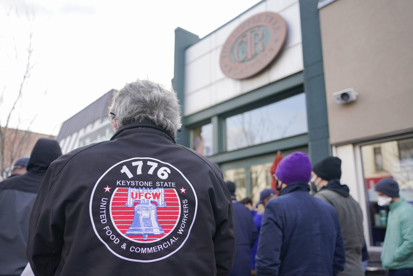 Union officials and local politicians hold a rally supporting unionization efforts at a coffee shop in Pittsburgh's Squirrel Hill neighborhood. (AP Photo/Keith Srakocic)