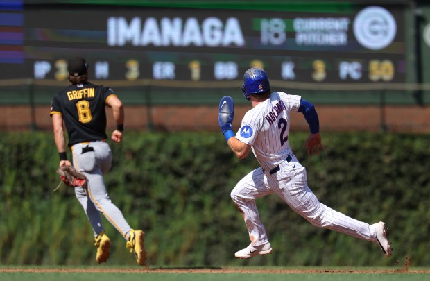 Cubs shortstop Nico Hoerner advances to third base on a Michael Conforto single in the third inning against the Pirates on Sept. 11, 2026, at Wrigley Field. (Chris Sweda/Chicago Tribune)