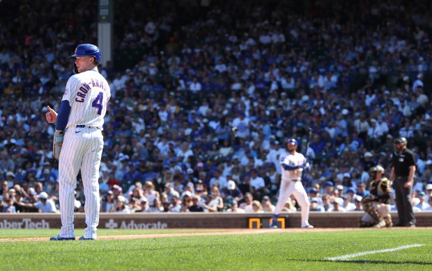 Cubs center fielder Pete Crow-Armstrong gives a thumbs-up while taking a lead off of third base in the fourth inning against the Pirates on Sept. 11, 2026, at Wrigley Field. (Chris Sweda/Chicago Tribune)