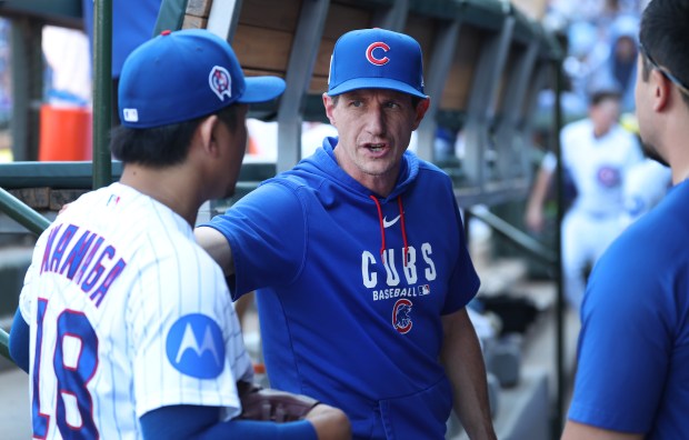Cubs manager Craig Counsell chats with starter Shota Imanaga after the top of the sixth inning against the Pirates on Sept. 11, 2026, at Wrigley Field. (Chris Sweda/Chicago Tribune)