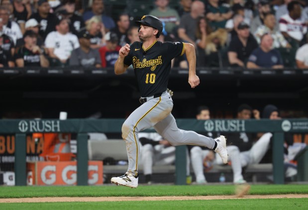 Pittsburgh Pirates designated hitter Bryan Reynolds (10) races home to score on a two-run single by teammate Spencer Horwitz in the second inning of a game against the Chicago White Sox at Rate Field in Chicago on Sept. 8, 2026. (Chris Sweda/Chicago Tribune)