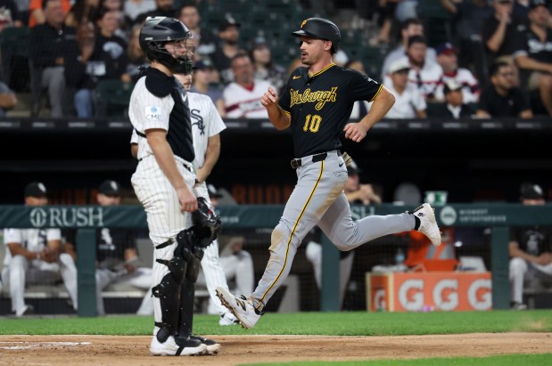 Pittsburgh Pirates designated hitter Bryan Reynolds (10) races home to score on a two-run single by teammate Spencer Horwitz in the second inning of a game against the Chicago White Sox at Rate Field in Chicago on Sept. 8, 2026. (Chris Sweda/Chicago Tribune)