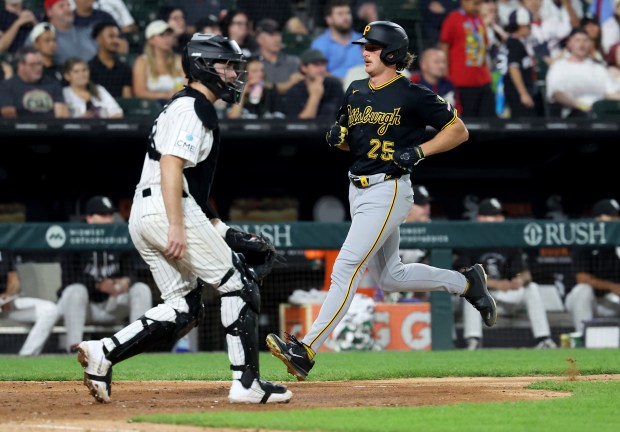Pittsburgh Pirates center fielder Billy Cook (25) comes in to score on a single by teammate Rafael Flores Jr. in the seventh inning of a game against the Chicago White Sox at Rate Field in Chicago on Sept. 9, 2026. (Chris Sweda/Chicago Tribune)