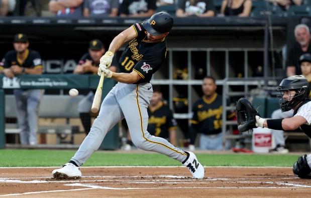 Pittsburgh Pirates designated hitter Bryan Reynolds (10) drives in a run on a double in the first inning of a game against the Chicago White Sox at Rate Field in Chicago on Sept. 8, 2026. (Chris Sweda/Chicago Tribune)
