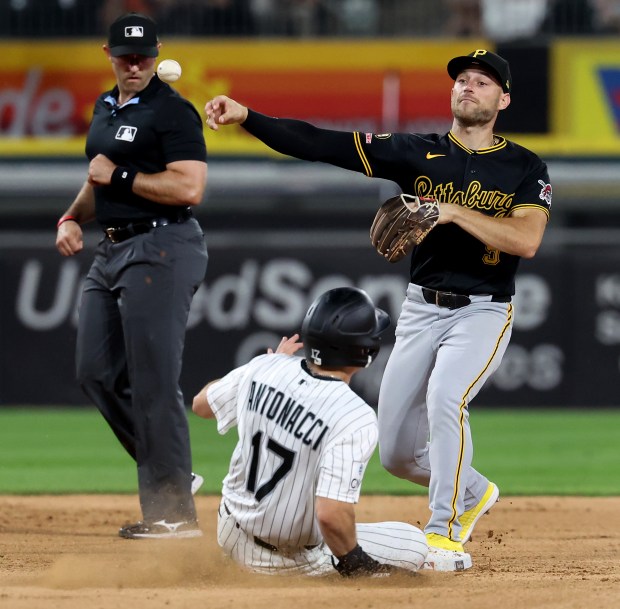 Pittsburgh Pirates second baseman Brandon Lowe completes a throw to first base for a double play after forcing out Chicago White Sox left fielder Sam Antonacci (17) at second base in the sixth inning of a game at Rate Field in Chicago on Sept. 8, 2026. (Chris Sweda/Chicago Tribune)