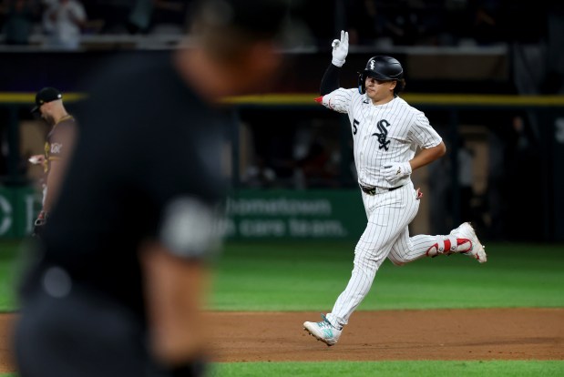 Chicago White Sox first baseman Munetaka Murakami (5) celebrates as he rounds the bases after hitting a solo home run in the eighth inning of a game against the Pittsburgh Pirates at Rate Field in Chicago on Sept. 9, 2026. (Chris Sweda/Chicago Tribune)