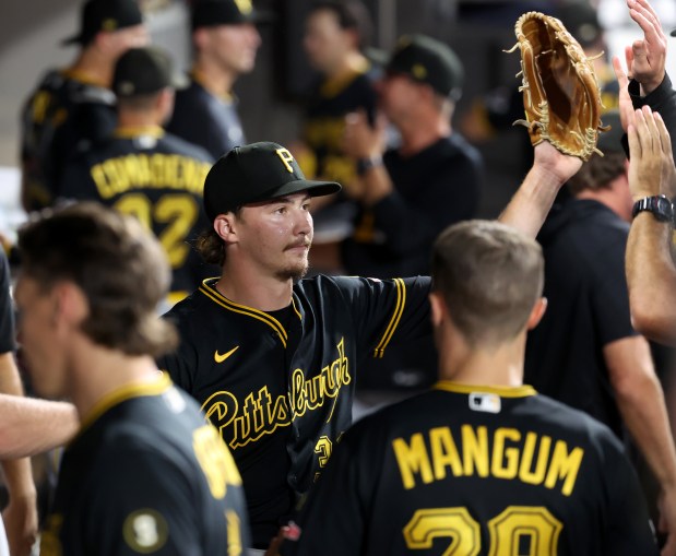 Pittsburgh Pirates starting pitcher Bubba Chandler (36) is congratulated by his teammates in the dugout after finishing off the Chicago White Sox in the sixth inning of a game at Rate Field in Chicago on Sept. 8, 2026. (Chris Sweda/Chicago Tribune)