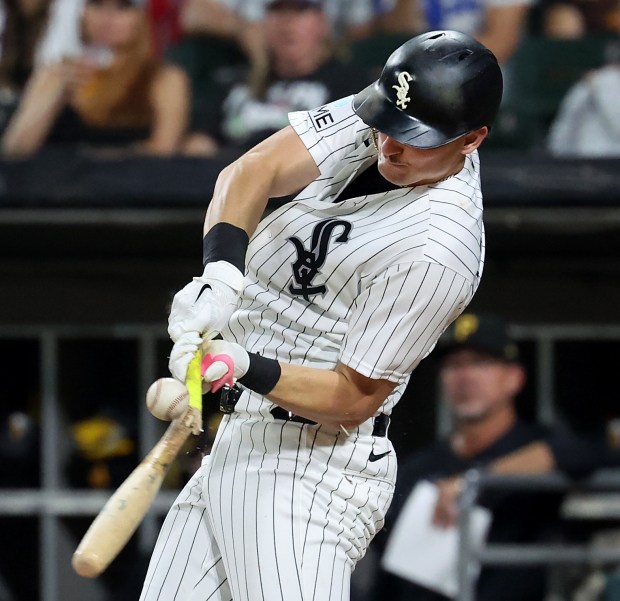 Chicago White Sox shortstop Colson Montgomery (12) breaks his bat as he drives in a run on a ground out in the seventh inning of a game against the Pittsburgh Pirates at Rate Field in Chicago on Sept. 8, 2026. (Chris Sweda/Chicago Tribune)