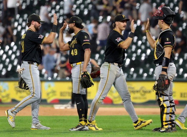 The Pittsburgh Pirates celebrate after defeating the Chicago White Sox at Rate Field in Chicago on Sept. 8, 2026. (Chris Sweda/Chicago Tribune)
