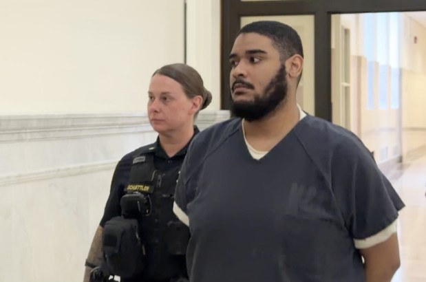 Isaiah Castro is escorted by a deputy sheriff to his sentencing hearing in Montgomery County Court on charges linked to stabbing on SEPTA bus. (Photo by Carl Hessler Jr. - MediaNews Group)