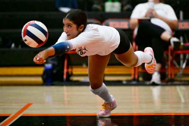 Legacyâs Gianna Sanchez dives for the ball on Sept. 9,...