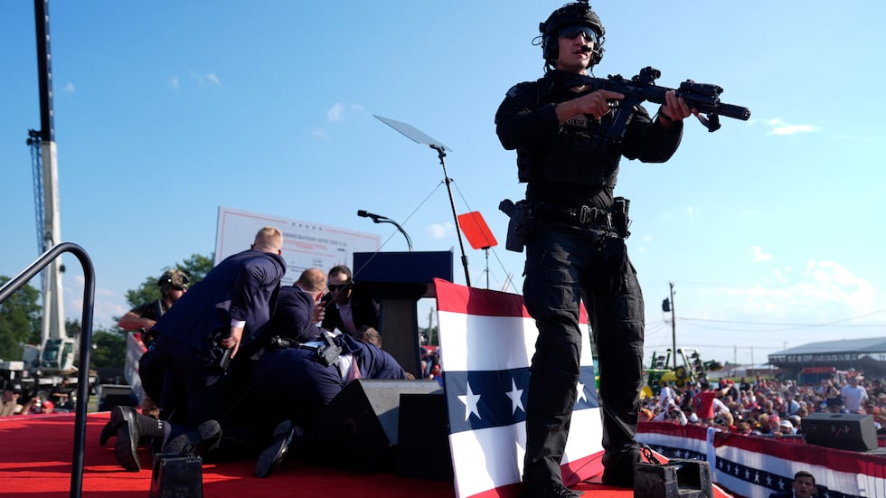 FILE - Republican presidential candidate former President Donald Trump is covered by U.S....