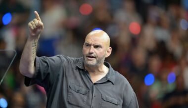 Sen. John Fetterman speaks at a Democratic campaign event with Vice President Kamala Harris and Minnesota Gov. Tim Walz at Temple University's Liacouras Center on Aug. 6, 2024.