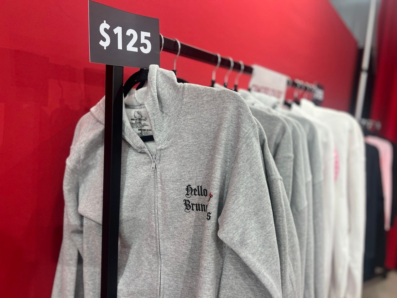 Bruno Mars and Hello Kitty collaboration grey hoodies.