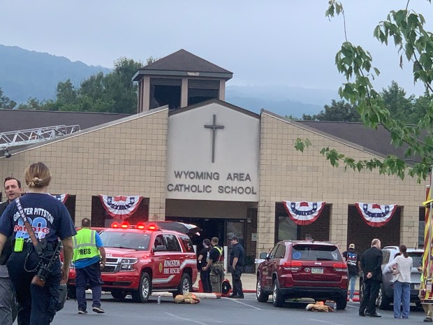 Students and staff have been evacuated after a fire broke out around 10 a.m. Tuesday morning at Wyoming Area Catholic School at 1690 Wyoming Ave., Exeter, according to the Wyoming Area Regional Police Department. (CHRISTOPHER DOYLE / STAFF PHOTOGRAPHER