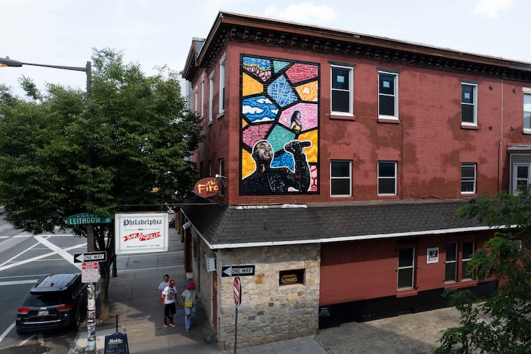 A mural featuring John Legend titled “Legendary Performances” by Alloyius Mcilwaine on The Fire music venue in Philadelphia on Sunday, July 28, 2024.