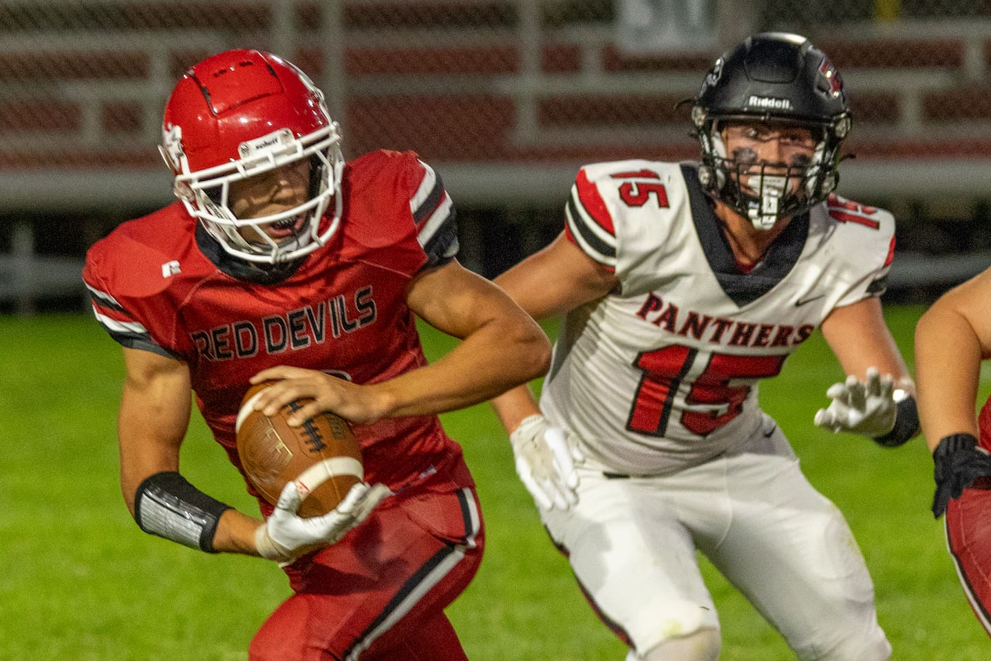 Dylan Glynn (7) of Hall runs ball as Evan Steimle (15) of Erie-Prophetstown trails last season at Richard Nesti Stadium in Spring Valley.