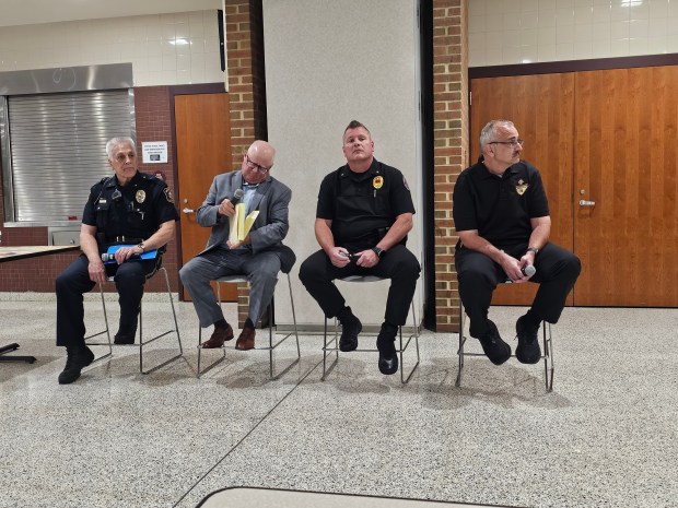 The community meeting Thursday at Gov. Mifflin Intermediate School brought together Shillington Police Chief Brett Hivner, Berks County District Attorney John Adams, Cumru Township Police Chief Madison Winchester and district Director of Safe Schools and School Culture Jeff Reichert to discuss recent safety incidents on district property. (MICHELLE LYNCH/READING EAGLE)