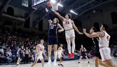 Penn forward TJ Power lays up the basketball against Cornell on Feb. 14.