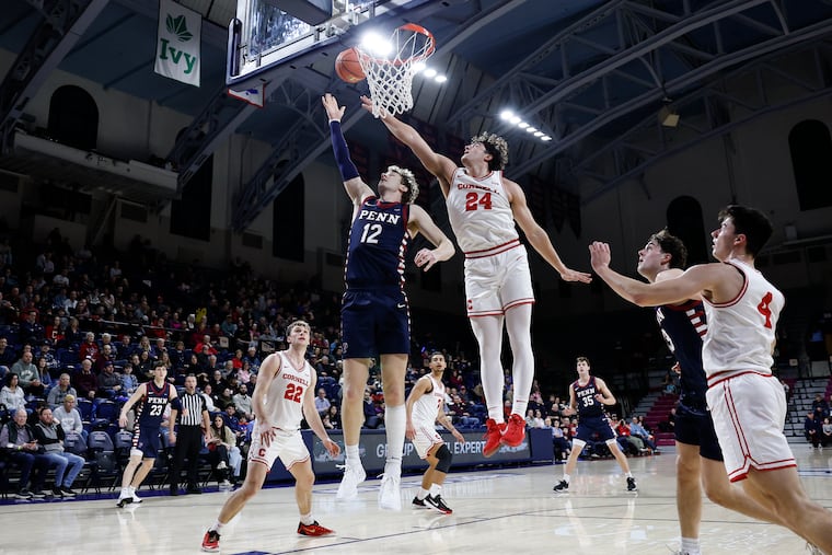 Penn forward TJ Power lays up the basketball against Cornell on Feb. 14.