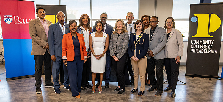caption: (Left to right, first row) Renita Miller, Alycia Marshall, Kelly Jordan-Sciutto, Lisa Sanders, Glenn Bryan, and Mindy Posoff. (Second row) Chris Arlene, Harold T. Epps, Franne McNeal, Praveen Kosuri, Richard Perry, and Danielle Liautaud-Watkins at the Penn-CCP Entrepreneurship Academy signing event on September 10. Photo by Elizabeth Field