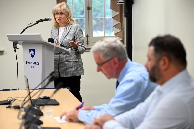 State Sen. Judy Schwank invites questions for state Agriculture Secretary Russell Redding, middle, and state veterinarian Dr. Alex Hamberg during an agriculture update event in the Janssen Conference Center at the Penn State Berks campus on Friday, Sept. 25, 2026.(BILL UHRICH/READING EAGLE)