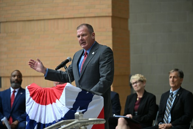 Lt. Col. Jay Ostrich of the Berks County Veterans Affairs speaks during the Berks Remembers 25th Anniversary of Sept. 11, 2001, on Friday at the Berks County Services Center. (BILL UHRICH/READING EAGLE)