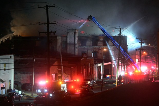 Reading firefighters battle a two-alarm blaze at the former Lincoln Chemical Co. building at Ninth and Laurel streets on Nov. 2, 2023. Officials ruled the fire an arson. (BILL UHRICH -READING EAGLE)