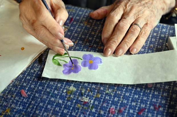 Pat Oxenford of Douglassville creates decoratively painted book marks during the Heemet Fescht at the Pennsylvania German Cultural Heritage Center at Kutztown University on Saturday, Sept. 26, 2026. (BILL UHRICH/READING EAGLE)