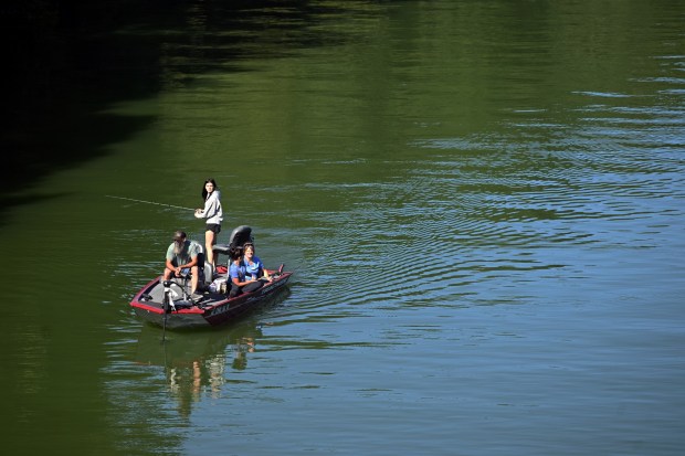 A family fishes from a boat at Blue Marsh Lake on Labor Day Monday, Sept. 7, 2026. (BILL UHRICH/READING EAGLE)