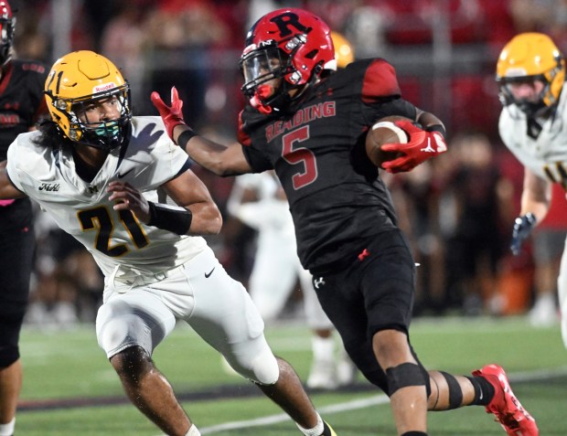 Reading High's Tyrice Bradley turns upfield against Muhlenberg at Shirk Stadium on Thursday, Sept. 3, 2026. (BILL UHRICH/READING EAGLE)